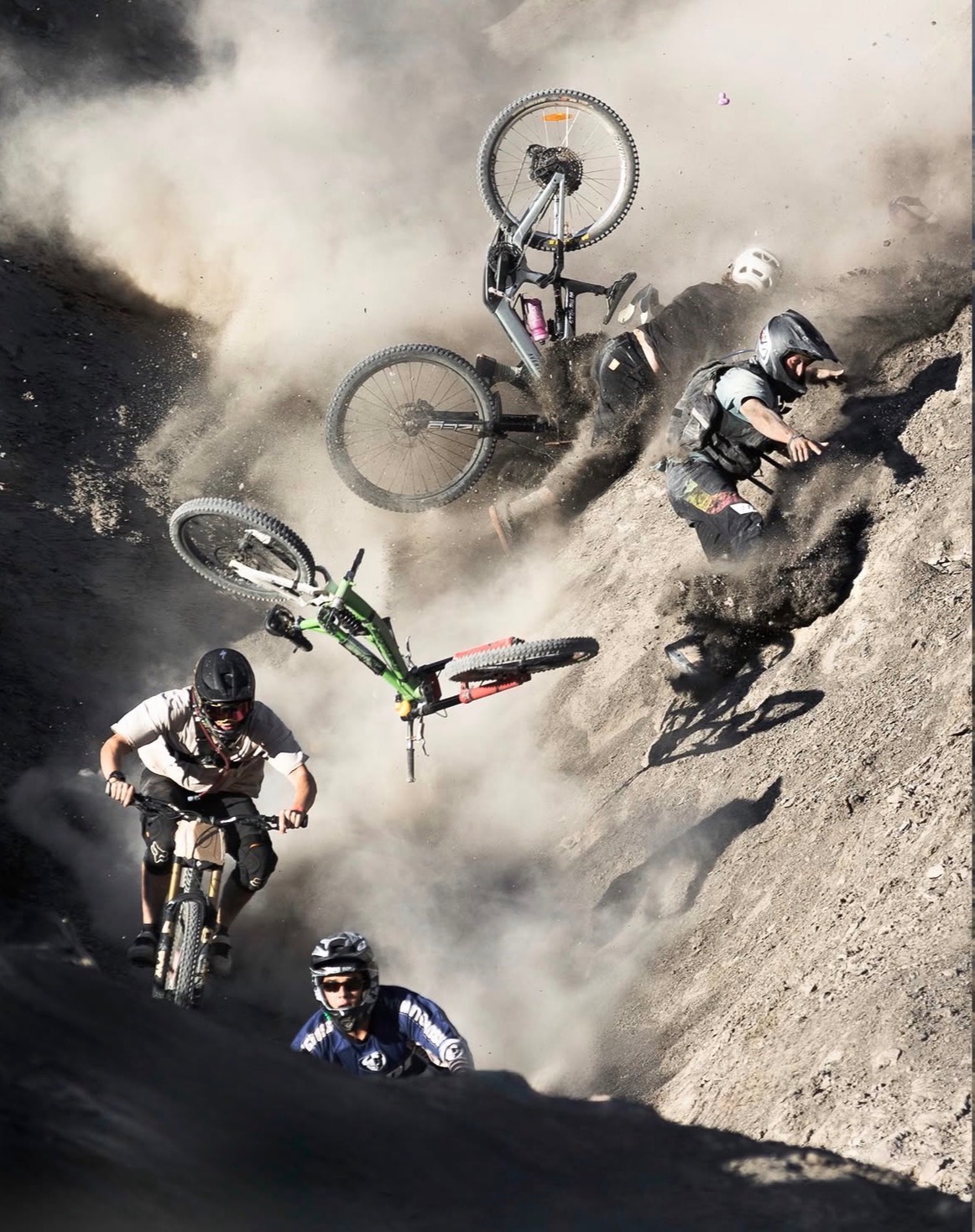 Me riding through the dust at the Green River Classic as other riders crash behind me